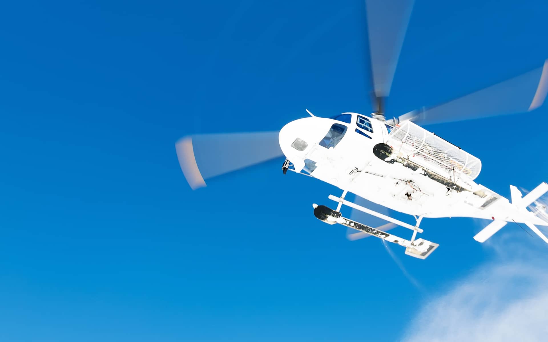 Technician troubleshooting helicopter electrical systems